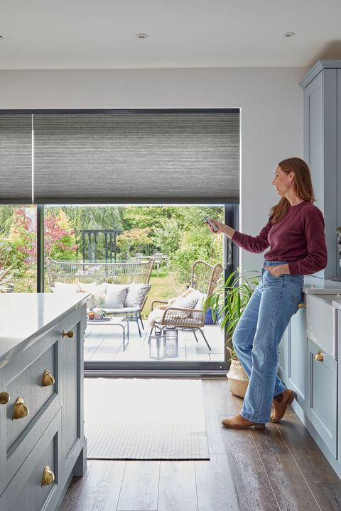 electric grey duette pleated blinds on sliding patio doors in kitchen