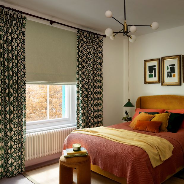 loxly emerald velvet curtains paired with kendra sage roman blinds in modern minimalist bedroom