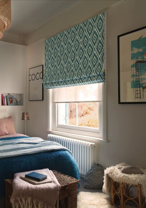 mali peacock blue geometric roman blind on bedroom window
