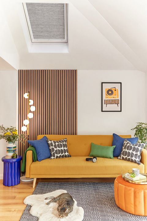 grey pleated skylight blind in modern living room with bright furnishings