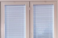 close up of perfect fit venetian blinds on french doors