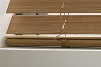 brown wooden blinds with colour coordinated railbar