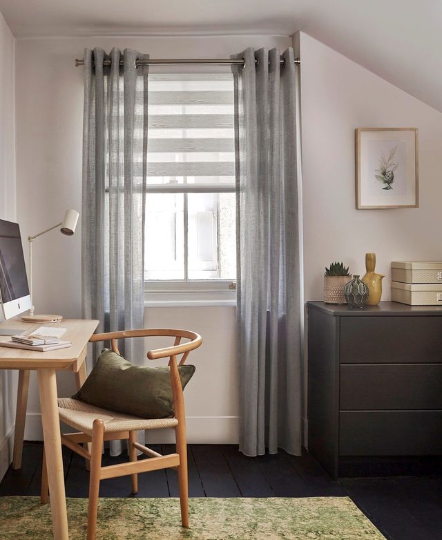 silver voile curtains paired with white day and night blinds on small bedroom window