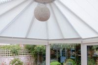 motorised pleated blinds on shaped conservatory roof