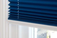 navy blue pleated blinds with white bottom rail