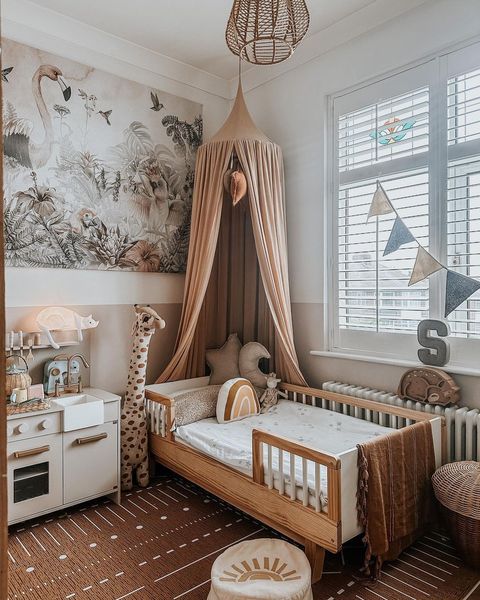 white shutters on window in neutral scandi inspired childs bedroom