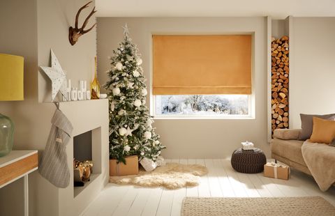 yellow roman blind in nordic christmas themed living room