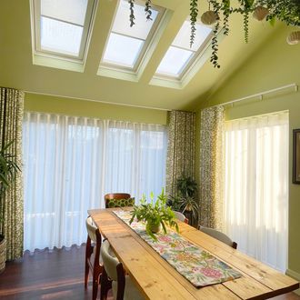 Wirl-kiwi-curtains-on-patio-doors-with-white-skylight-roller-blinds-echo-white-sheer-curtains-in-sage-green-dining-area