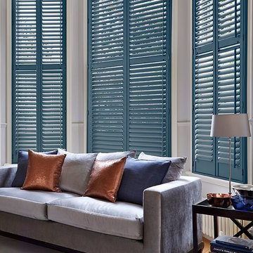 blue shutters in a modern living room