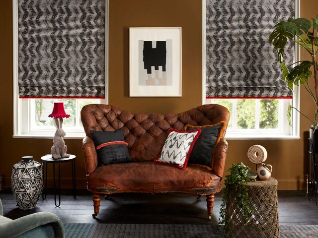 Hillarys Cadillac Noir Roman Blinds With Colette Vixen Fringing And Cley Mole And Wolfe Smoulder Cushions