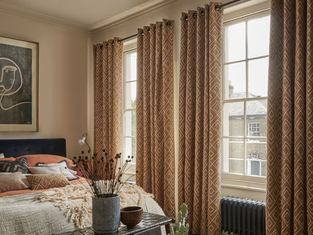 Hillarys Abigail Ahern Collection of Curtains in a Modern and Autumnal Bedroom with dark tones