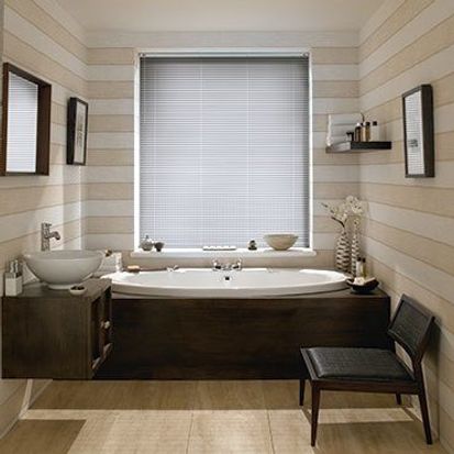 Sheer Luxury Brushed Silver Venetian blinds in a cosy bathroom