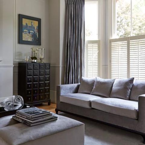 Cafe Style White Shutters In the Living Room