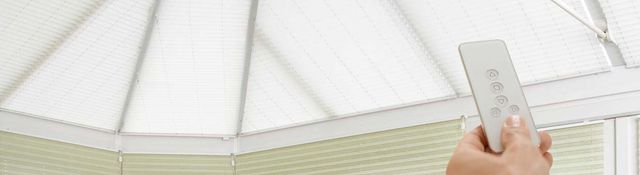 motorised-roof-blinds-conservatory-white-pleated