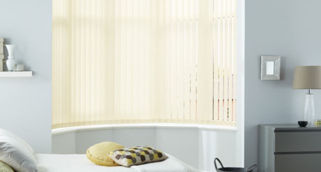 Bedroom Blind Ideas - Yellow Vertical Blind in a bedroom bay window